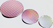 Peregrine Semiconductor’s UltraCMOS technology platform now includes 300 mm wafers. Pictured are wafers from the UltraCMOS 11 technology platform (left), UltraCMOS 10 platform (centre) and UltraCMOS silicon on sapphire (right).